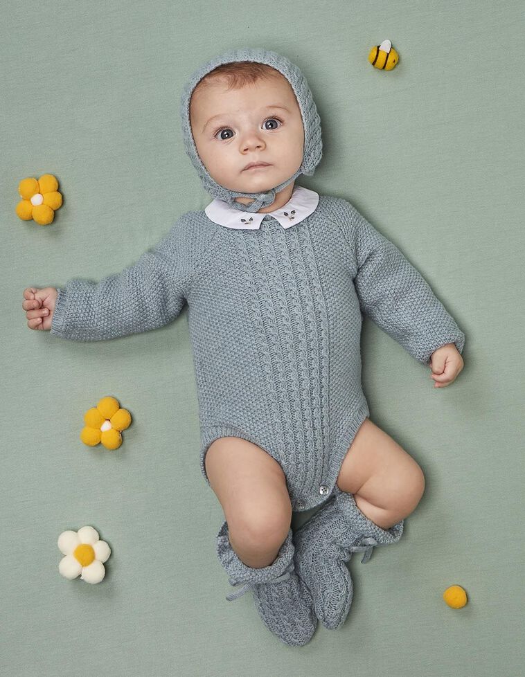 Macacão curto de malha arroz com lã azul