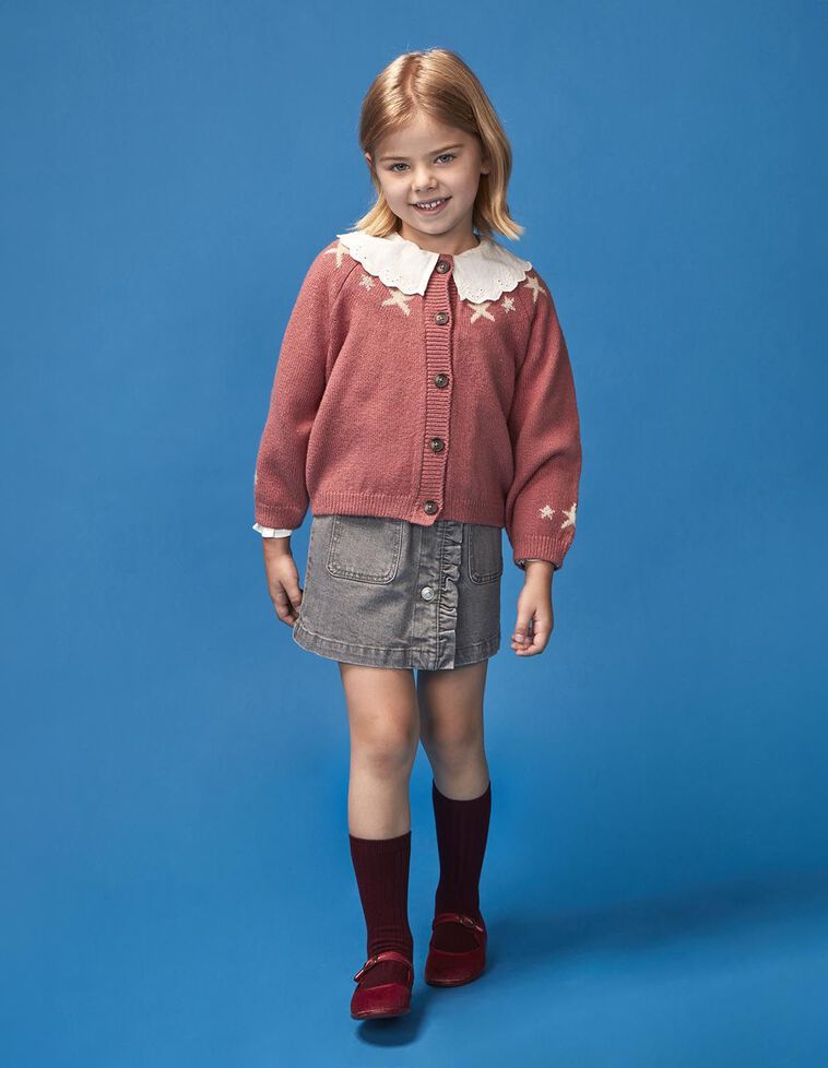 Casaco com estrelas vermelho