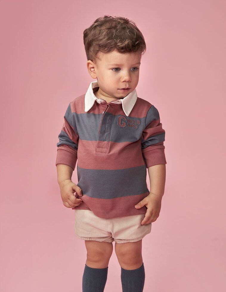 Polo às riscas com remendo vermelho