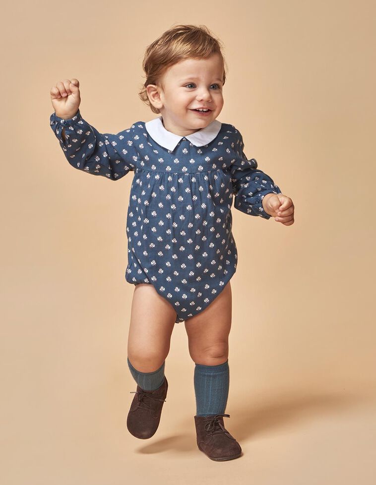 Macacão de manga comprida estampada azul